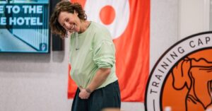 Claire Fellows smiling softly in a natural light setting, known as the former wife of British chef Ainsley Harriott.