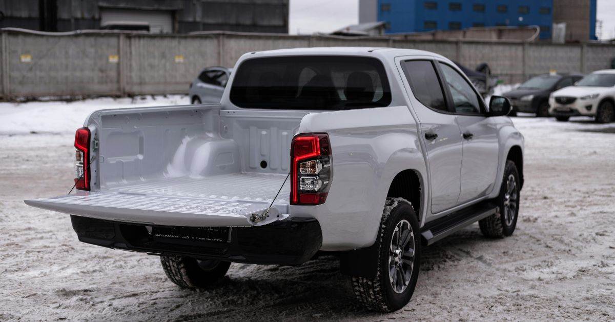 6.5-foot truck bed for 2011 GMC 3500HD showing dimensions and heavy-duty steel cargo space