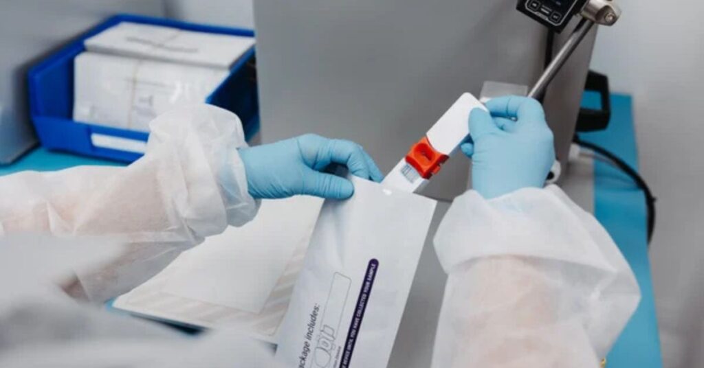 Professional laboratory testing kit with sample cassette, pipette and reagent bottle used for medical and scientific analysis